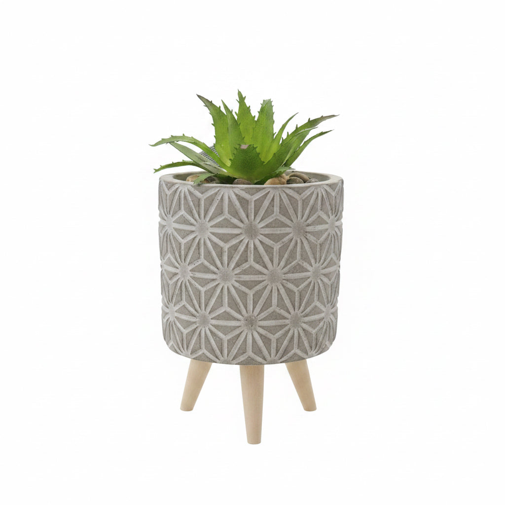 Artificial plant in pot on stand