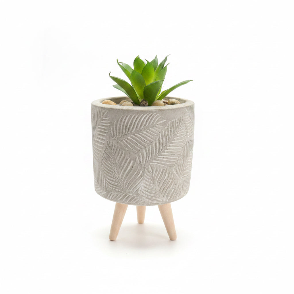Artificial plant in pot on stand