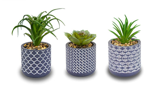 Artificial plant in navy geo pot