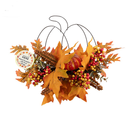 Hanging metal pumpkin with faux foliage