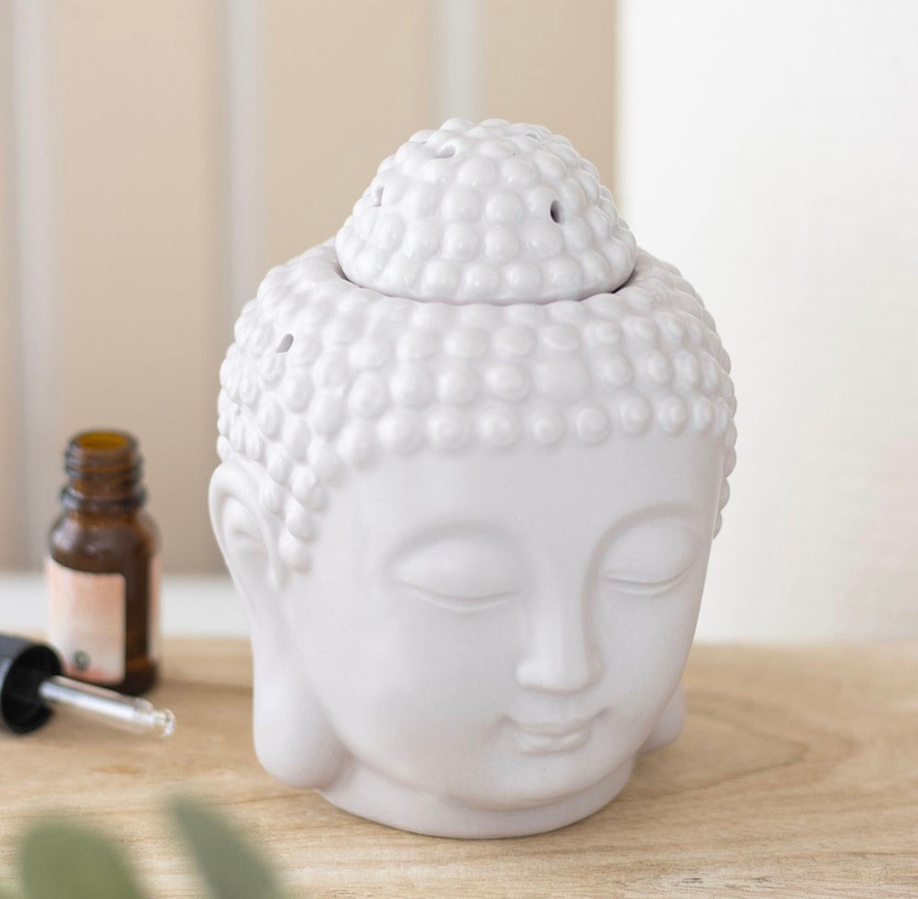 Small grey Buddha oil burner