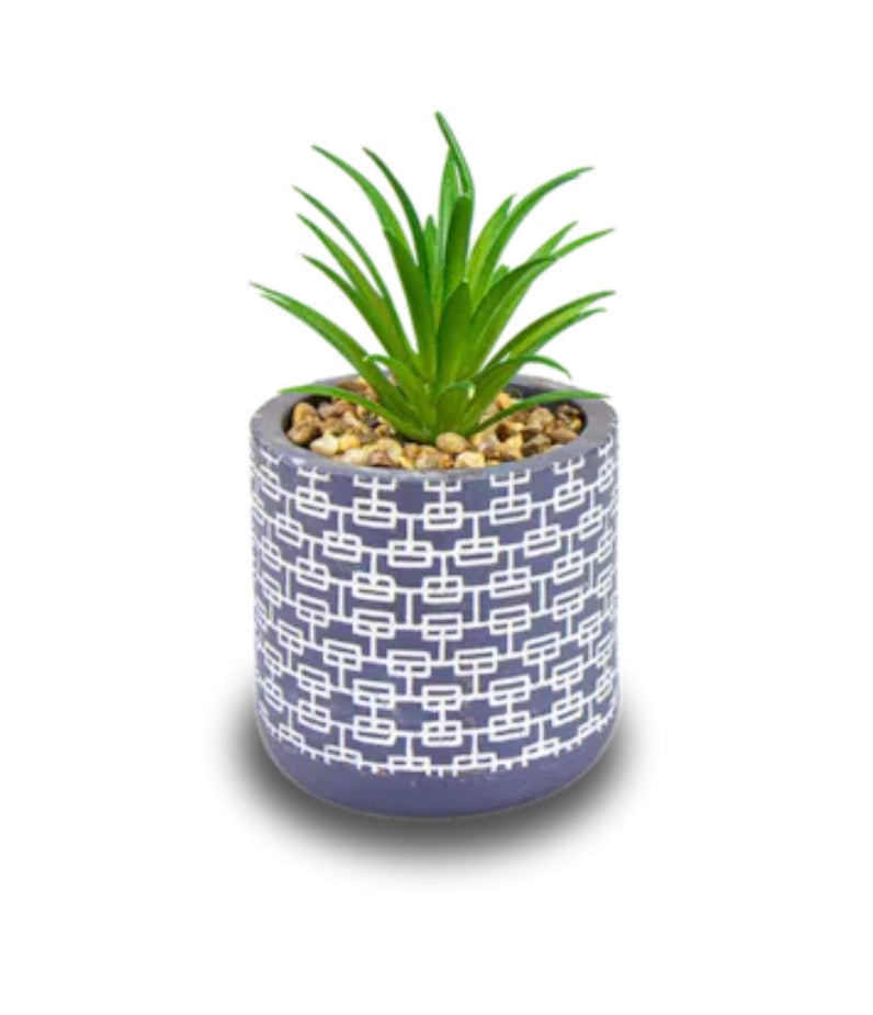 Artificial plant in navy geo pot