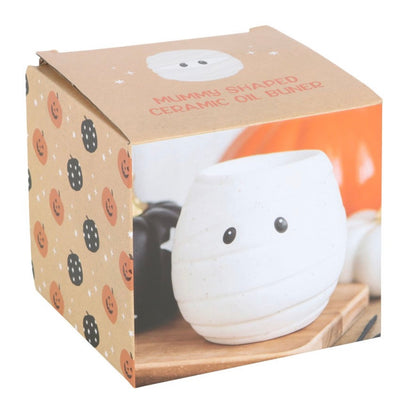 Mummy shaped oil burner