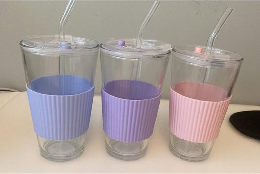 Glass cup with ribbed sleeve image 1
