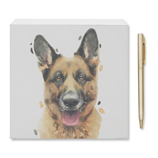 German shepherd portrait notepad beside a gold-coloured pen on a white background